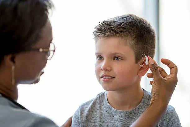 Hearing aid fitting for a child during an audiology assessment