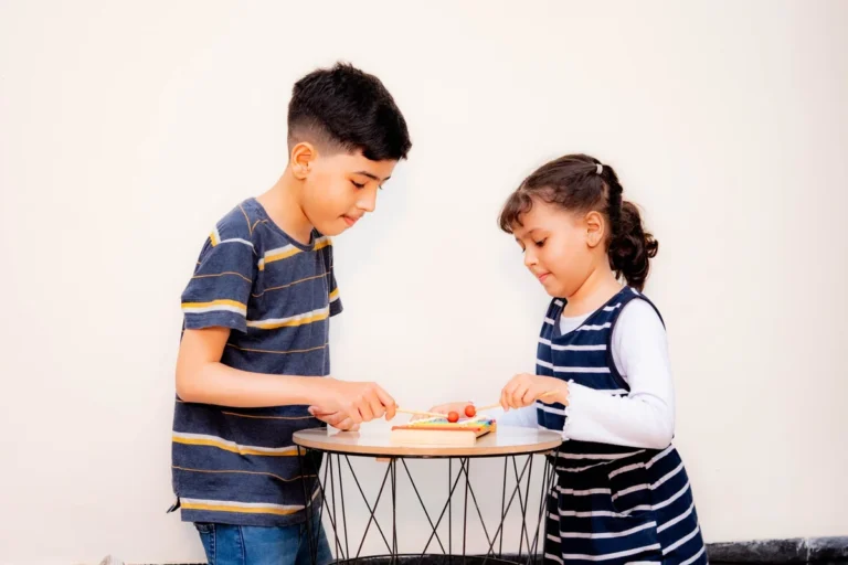 Children working on a play based activity at Speech Rehab Clinic